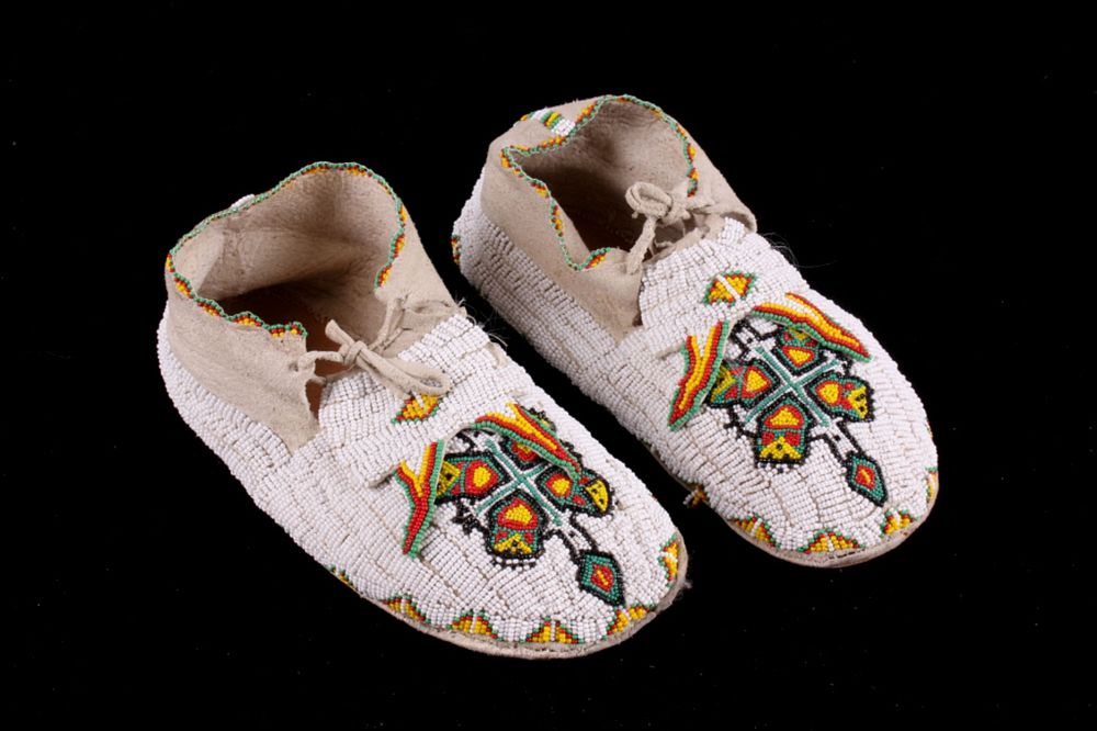 Appraisal: Sioux Turtle Beaded Bifurcated Hide Moccasins The lot features a