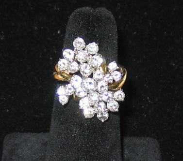 Appraisal: DIAMOND CLUSTER RING Lady's ring with round brilliant cut diamonds