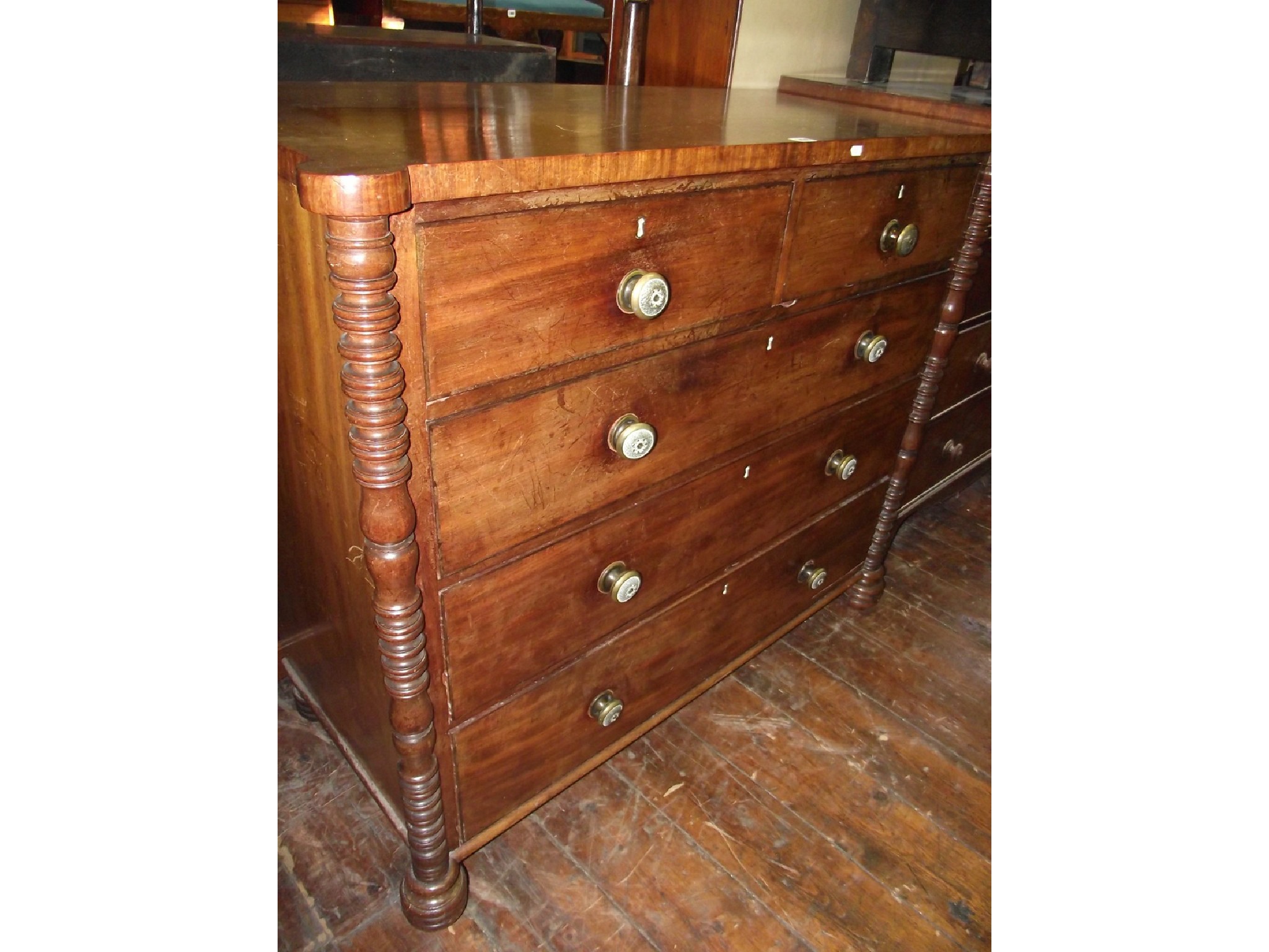 Appraisal: A Regency mahogany chest of three long and two short