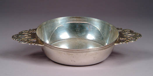 Appraisal: DOUBLE HANDLED STERLING SILVER PORRINGER BY CARTIER Round bowl with