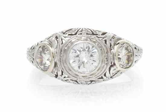 Appraisal: A Platinum and Diamond Ring containing three round brilliant cut