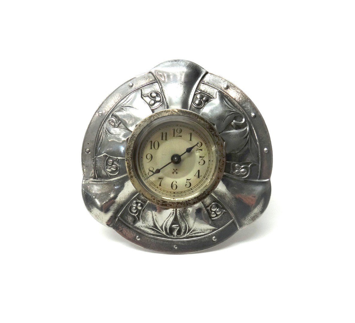 Appraisal: A Liberty Co pewter clock strut back with leaf and