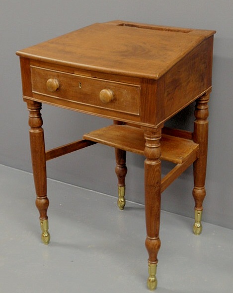 Appraisal: Unusual Sheraton mahogany trapezoidal top desk mid th c perhaps