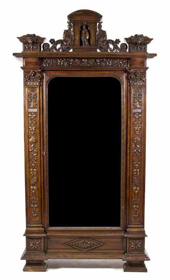 Appraisal: A Renaissance Revival Mahogany Linen Cabinet the stepped cornice carved