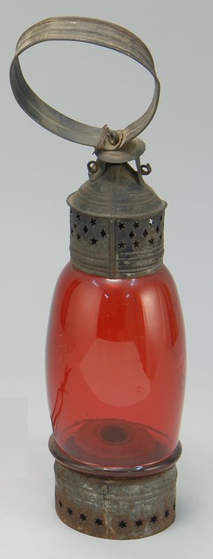 Appraisal: TIN HAND LANTERN th CenturyWith ruby-red glass font Pierced metal