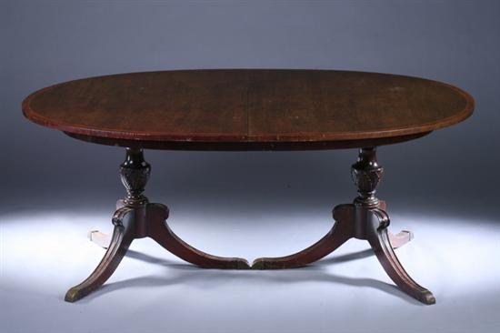 Appraisal: GEORGIAN STYLE DOUBLE-PEDESTAL DINING TABLE th century with three -inch