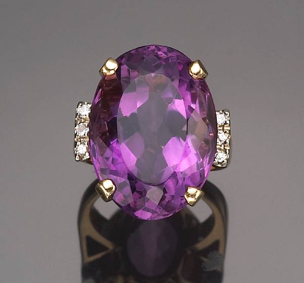 Appraisal: An amethyst and diamond ring estimated amethyst weight carats mounted