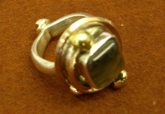 Appraisal: Designer ring by Tom McEwan with silver hallmarked shank set