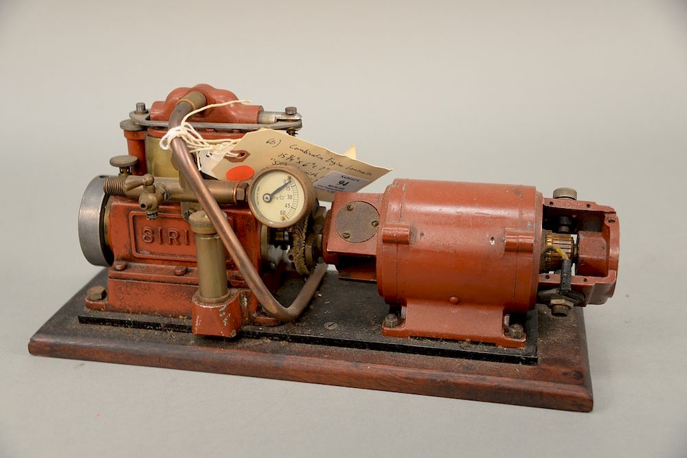 Appraisal: Steam engine generator combination with pressure gauge flywheel lg in