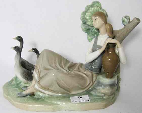 Appraisal: Lladro Figure of Seated Lady with Geese Height cm Length