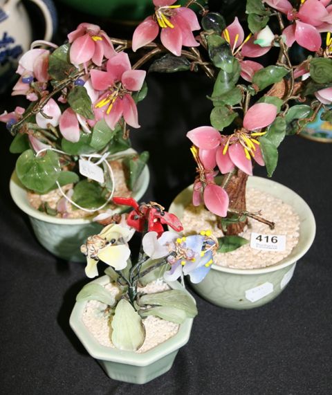 Appraisal: Three hardstone trees in celadon glazed pots