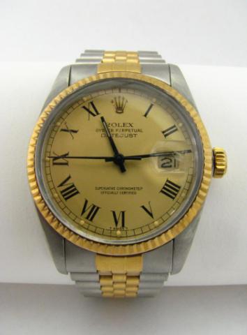 Appraisal: Rolex Datejust Oyster Perpetual two-tone gentleman's watch champagne dial black