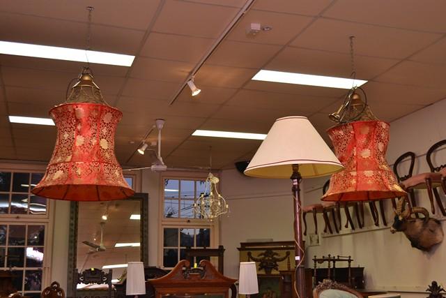 Appraisal: A PAIR OF ORIENTAL RED HANGING LIGHTS