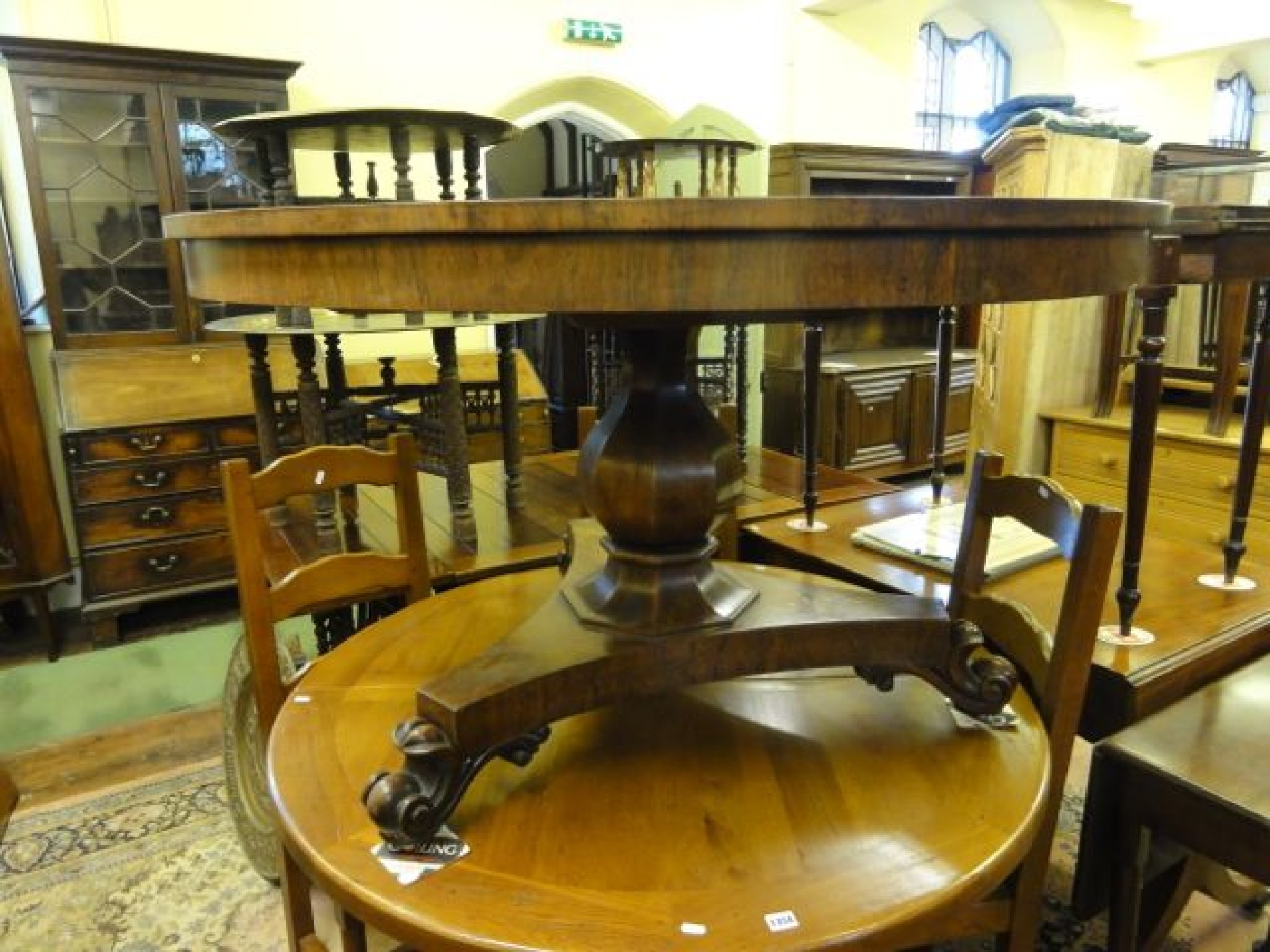 Appraisal: A late Regency rosewood tea table the circular top cm