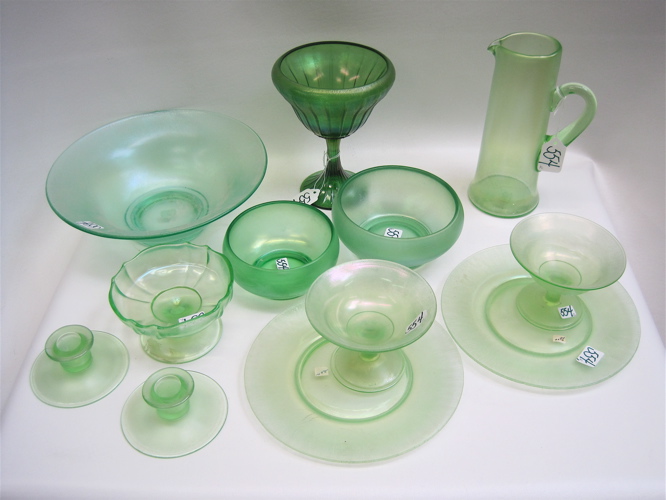 Appraisal: TWELVE PIECES OF GREEN STRETCH GLASS pieces two sets Fenton