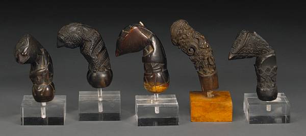 Appraisal: A lot of five Indonesian keris hilts th th century