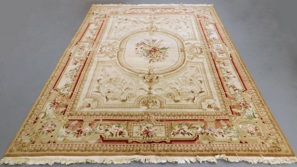 Appraisal: LG FLORAL AUBUSSON RUG France th Century Green pink and