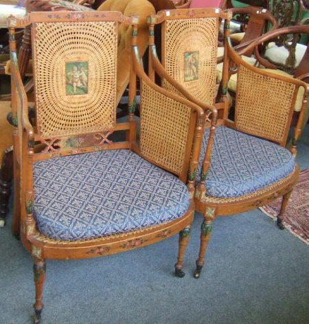 Appraisal: A pair of Edwardian painted beech elbow chairs each with