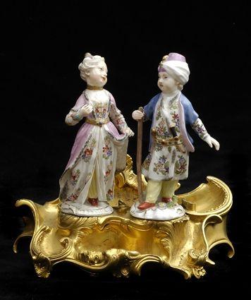 Appraisal: PAIR OF MEISSEN PORCELAIN FIGURES OF A BOY AND A