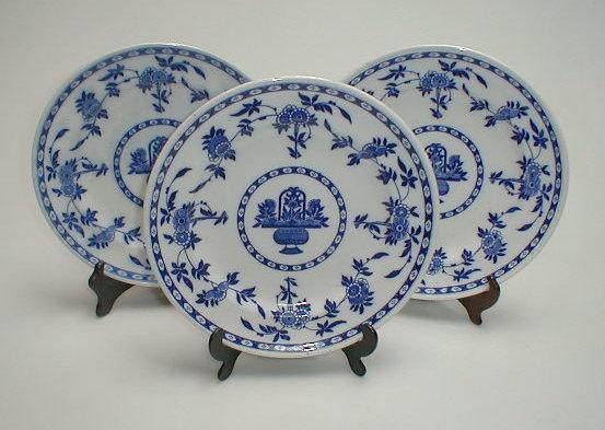 Appraisal: Three Mintons Delft pattern dinner plates