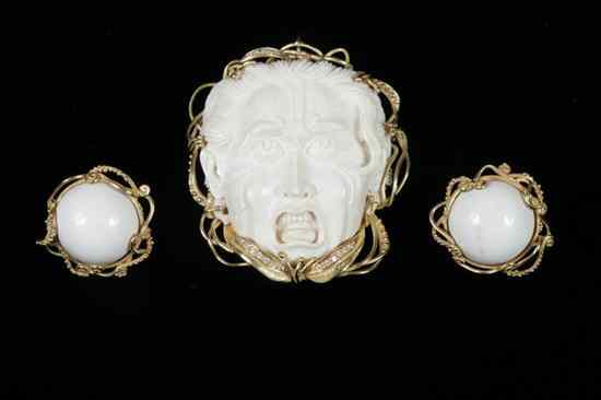 Appraisal: ITALIAN K YELLOW GOLD DIAMOND AND CARVED MAMMOTH IVORY MASK