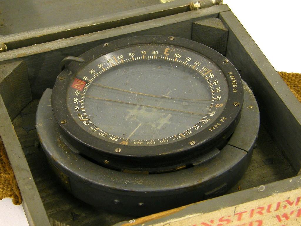 Appraisal: Military issue circular compass within a painted case inscribed type