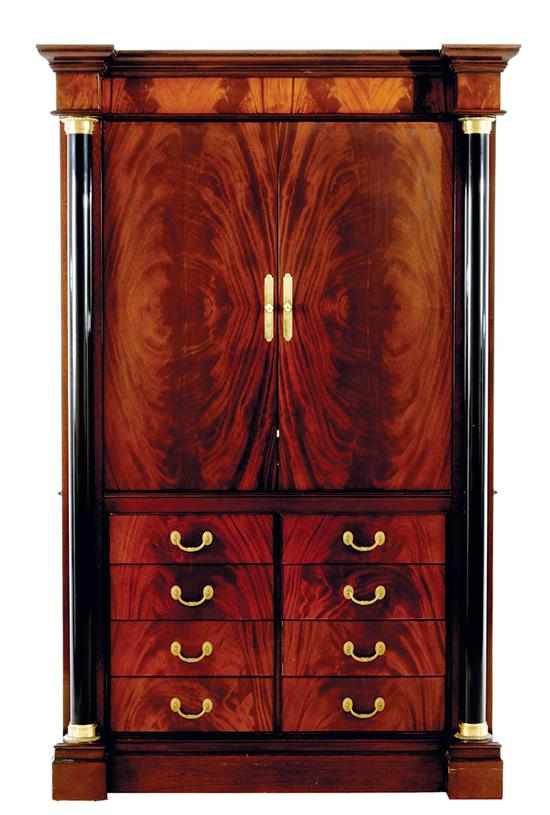 Appraisal: Mahogany linen press by M Craig molded crown over two