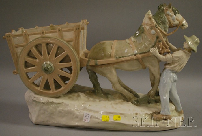 Appraisal: Large European Porcelain Man with Horse-drawn Cart Figural Group impressed