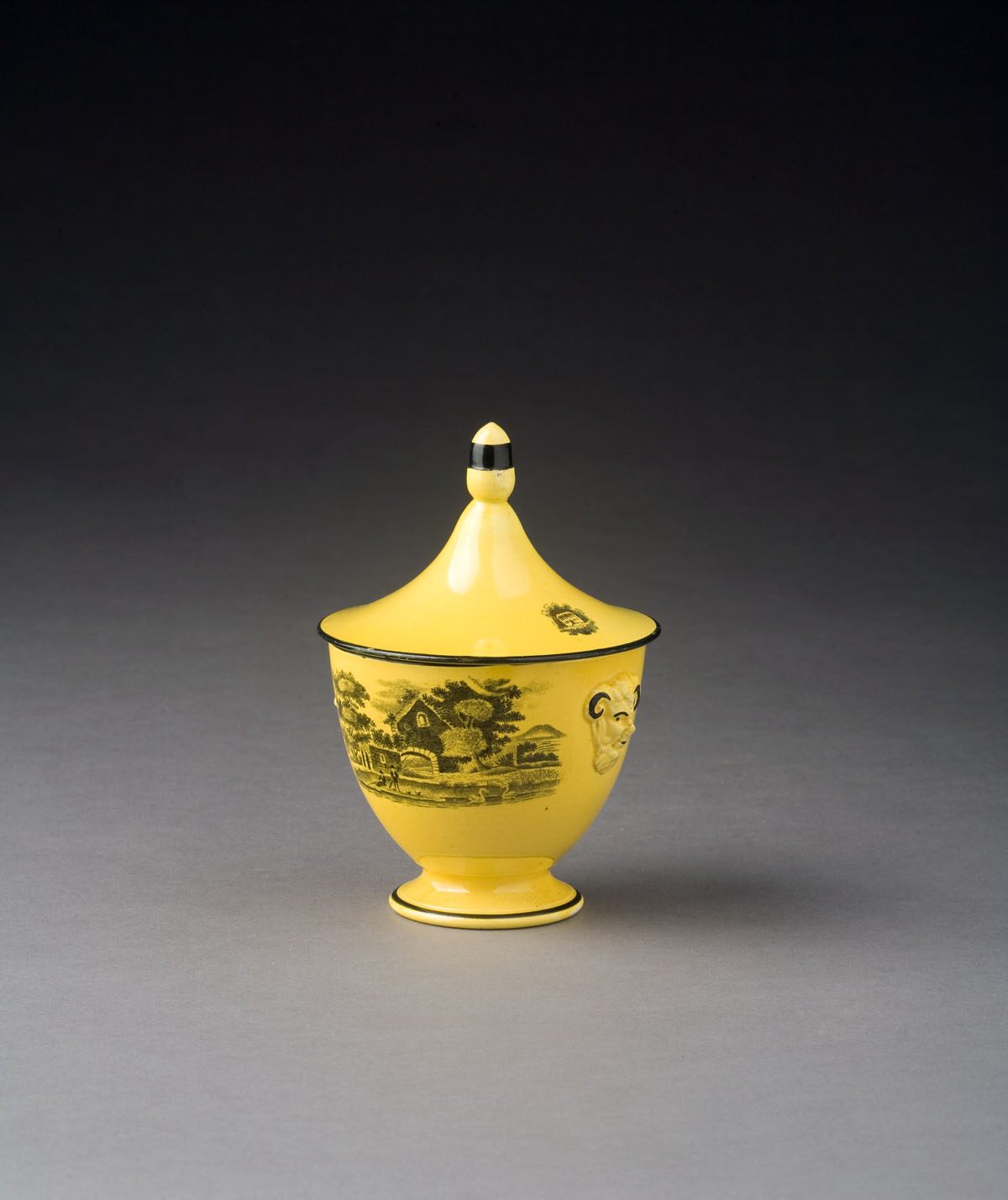 Appraisal: ENGLISH YELLOW-GLAZED BLACK TRANSFER-PRINTED SUGAR BOWL AND COVER CIRCA -