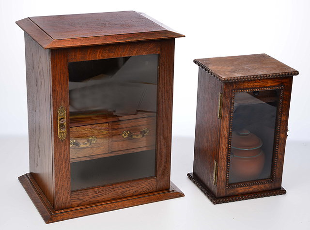 Appraisal: TWO EARLY TO MID TH CENTURY OAK SMOKERS CABINETS the