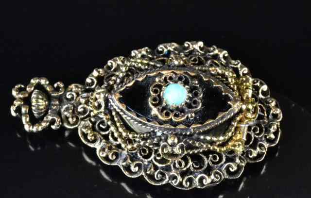 Appraisal: K Gold and Onyx Watch LocketA beautiful filigree locket in