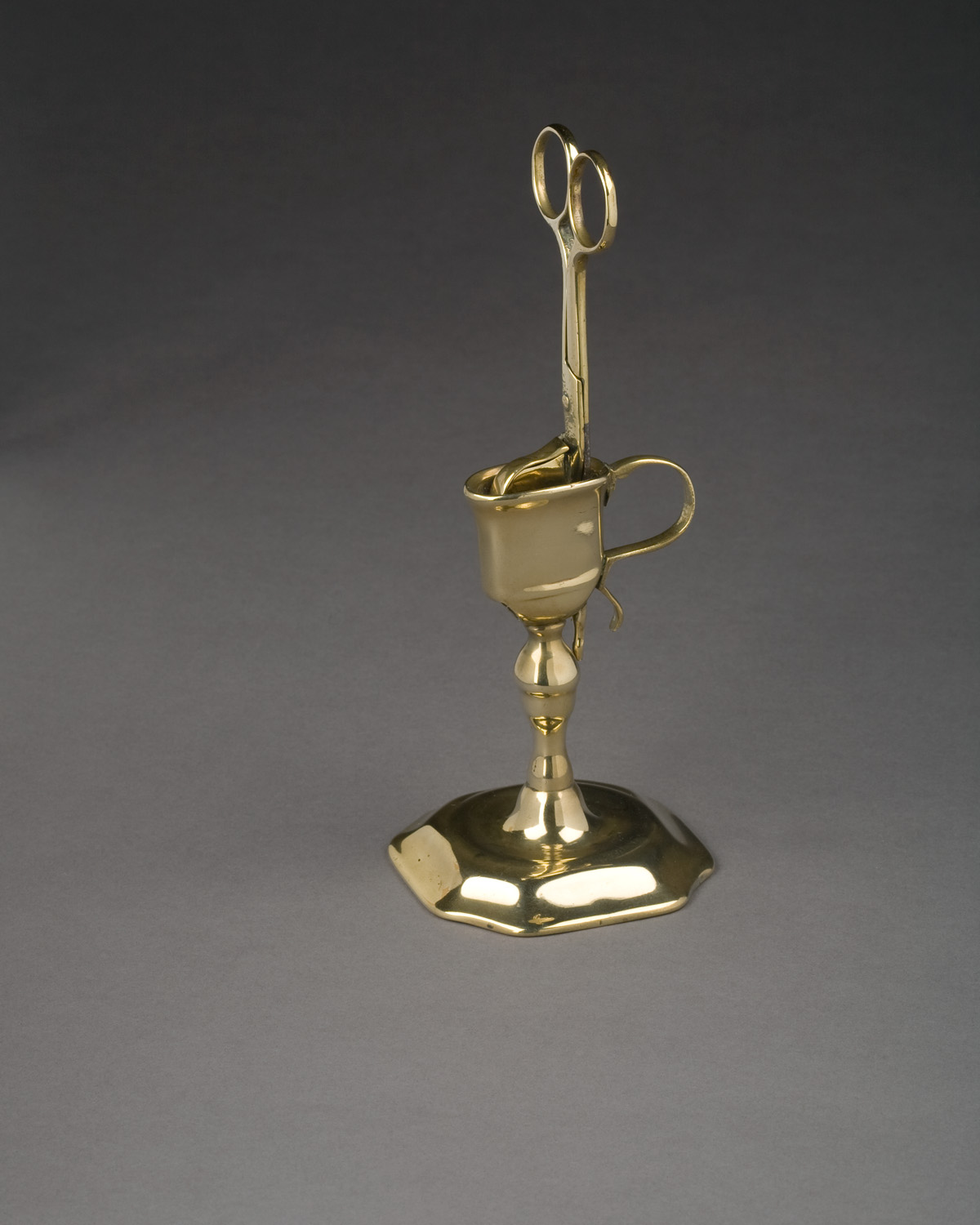 Appraisal: RARE GEORGE II BRASS UPRIGHT CANDLE SNUFFER AND HOLDER CIRCA