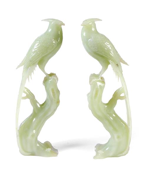 Appraisal: A pair of Chinese carved hardstone models of birds losses