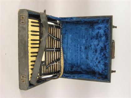 Appraisal: Marinucci accordian In a fitted case Approx H in Descriptions