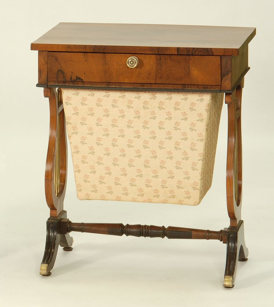 Appraisal: SEWING TABLE American th CenturyIn rosewood veneers with lyre-form supports