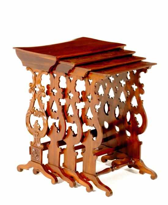 Appraisal: American Classical carved mahogany nesting tables circa rectangular top leading