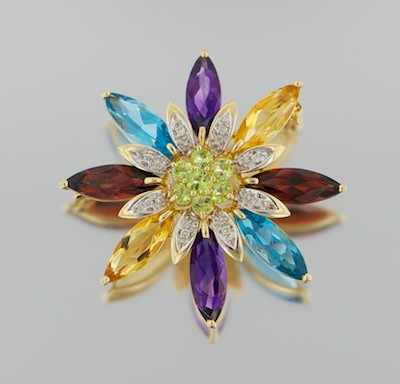 Appraisal: A Gem Set Gold Brooch k yellow gold flowerhead form