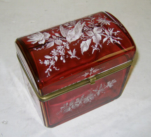 Appraisal: CRANBERRY GLASS DRESSER BOX Rectangular trunk form with brass mounted