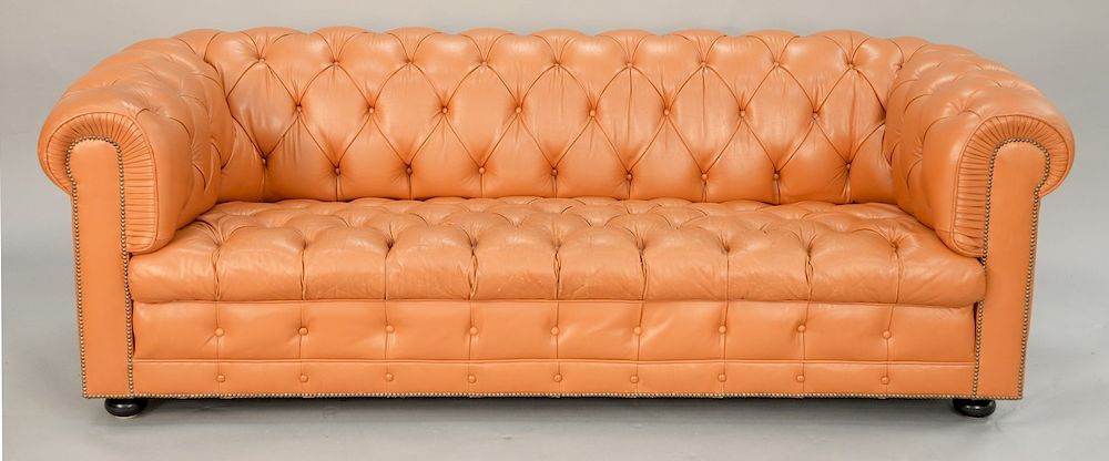 Appraisal: Chesterfield leather upholstered sofa some seat wear lg in Chesterfield