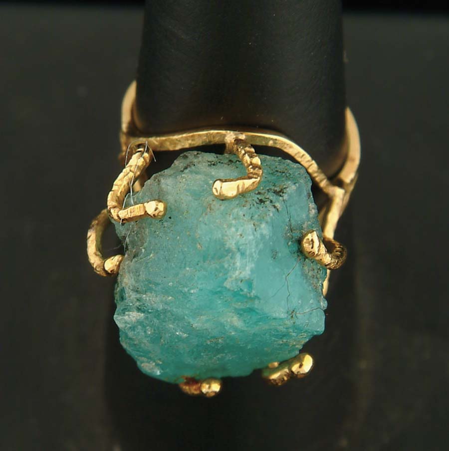 Appraisal: RAW EMERALD STONE K GOLD RING Huge uncut green emerald