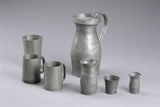 Appraisal: SEVEN PEWTER MEASURES European th century Baluster form with handle