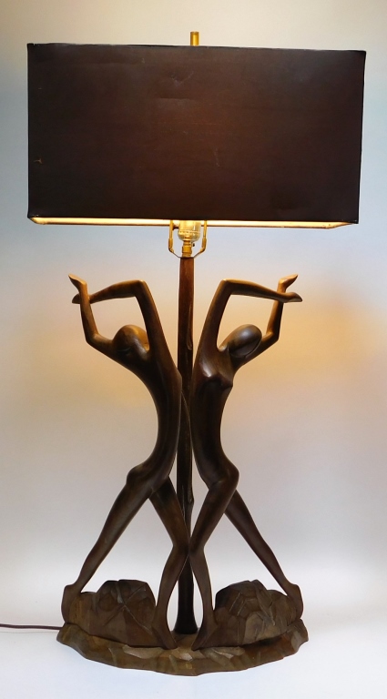 Appraisal: MODERN HIGH STYLE CARVED WOOD LAMP OF NUDE DANCERS United