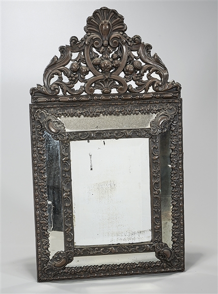 Appraisal: Antique repousse brass wall mirror with a rectangular beveled mirror