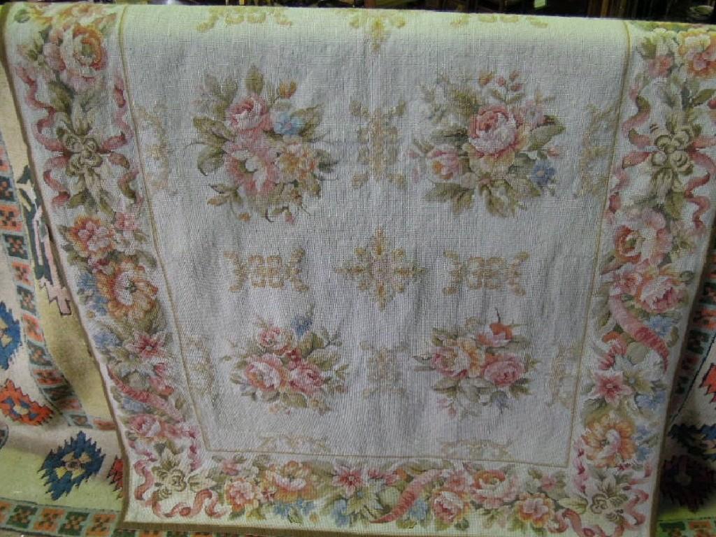 Appraisal: An Aubusson design wall hanging with clusters of flowers on