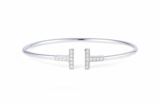 Appraisal: A Tiffany Co Gold and Diamond 'T' Bangle A Tiffany