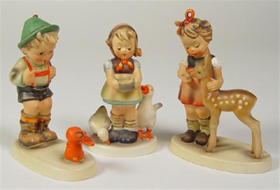 Appraisal: Three Hummel Figurines Girl feeding geese boy with toy gun