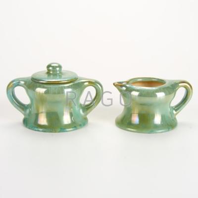 Appraisal: FULPER Sugar bowl and creamer in green flambe glaze Flemington