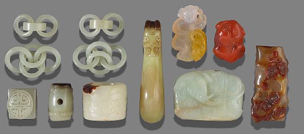 Appraisal: A group of twelve small jade and agate carvings Including