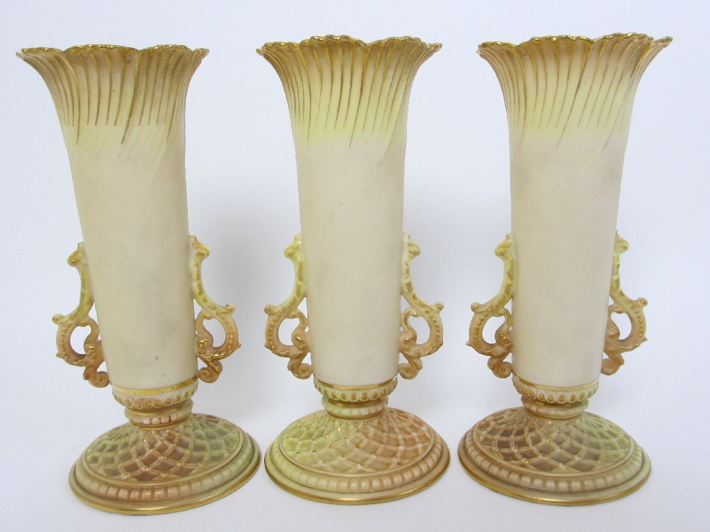 Appraisal: Three Royal Worcester spill vases the gilt and ivory ground