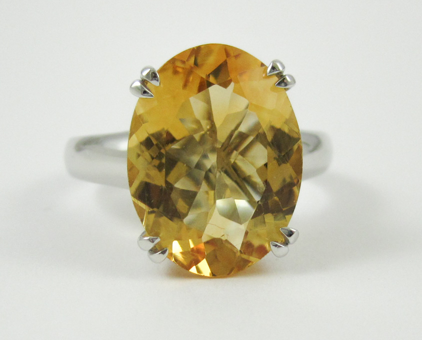 Appraisal: CITRINE AND FOURTEEN KARAT WHITE GOLD RING set with a